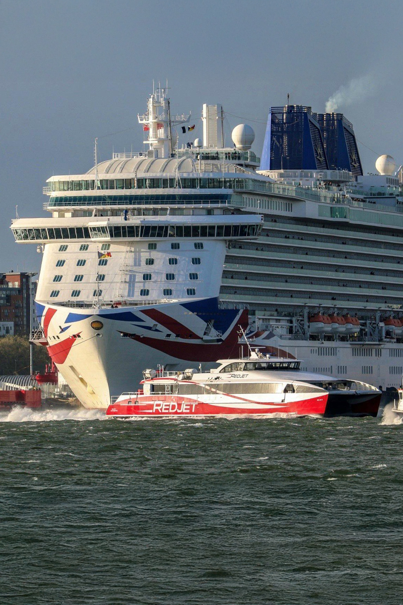 P&O cruise ship docked in Southampton alongside Red Jet ferry